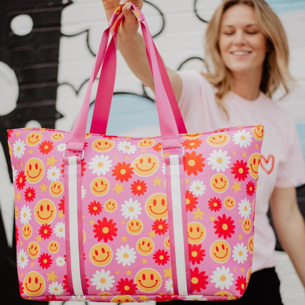 http://www.katydidwholesale.com/cdn/shop/products/tote-and-carry-smiley-face-hot-pink-floral_600x.jpg?v=1699998901